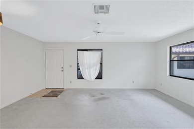 Located in the desirable gated community of Hammock Pine Village on Countryside Country Club in Florida - for sale on GolfHomes.com, golf home, golf lot