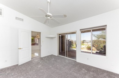 Step into comfort and style with this spacious 4-bedroom, 2 on London Bridge Golf Course in Arizona - for sale on GolfHomes.com, golf home, golf lot
