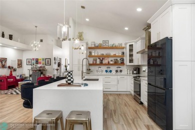 Beautifully updated home on an oversized 14,000 sq. ft. corner on TPC Eagle Trace in Florida - for sale on GolfHomes.com, golf home, golf lot
