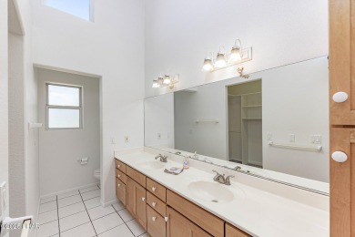 Step into comfort and style with this spacious 4-bedroom, 2 on London Bridge Golf Course in Arizona - for sale on GolfHomes.com, golf home, golf lot