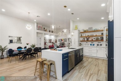 Beautifully updated home on an oversized 14,000 sq. ft. corner on TPC Eagle Trace in Florida - for sale on GolfHomes.com, golf home, golf lot