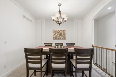 This beautifully updated reverse 1.5-story is just steps from on Prairie Highlands Golf Course in Kansas - for sale on GolfHomes.com, golf home, golf lot