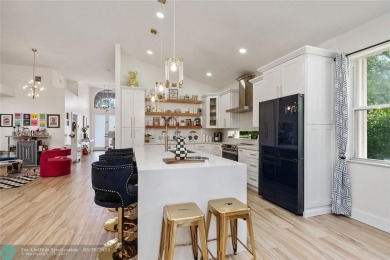 Beautifully updated home on an oversized 14,000 sq. ft. corner on TPC Eagle Trace in Florida - for sale on GolfHomes.com, golf home, golf lot