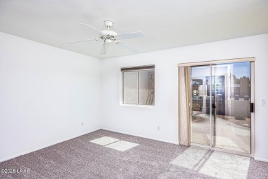 Step into comfort and style with this spacious 4-bedroom, 2 on London Bridge Golf Course in Arizona - for sale on GolfHomes.com, golf home, golf lot