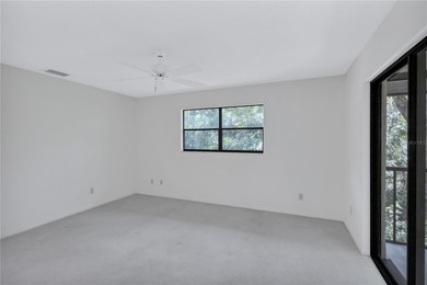 Located in the desirable gated community of Hammock Pine Village on Countryside Country Club in Florida - for sale on GolfHomes.com, golf home, golf lot