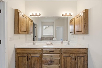 This beautifully updated reverse 1.5-story is just steps from on Prairie Highlands Golf Course in Kansas - for sale on GolfHomes.com, golf home, golf lot