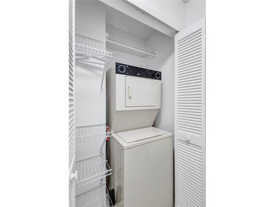 Located in the desirable gated community of Hammock Pine Village on Countryside Country Club in Florida - for sale on GolfHomes.com, golf home, golf lot