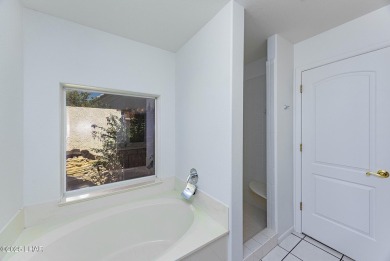 Step into comfort and style with this spacious 4-bedroom, 2 on London Bridge Golf Course in Arizona - for sale on GolfHomes.com, golf home, golf lot