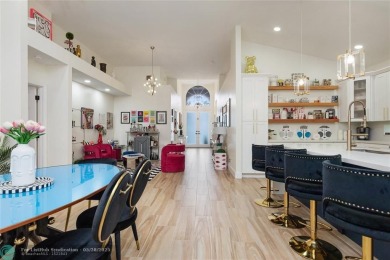 Beautifully updated home on an oversized 14,000 sq. ft. corner on TPC Eagle Trace in Florida - for sale on GolfHomes.com, golf home, golf lot
