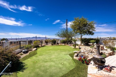 Step into comfort and style with this spacious 4-bedroom, 2 on London Bridge Golf Course in Arizona - for sale on GolfHomes.com, golf home, golf lot