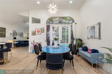 Beautifully updated home on an oversized 14,000 sq. ft. corner on TPC Eagle Trace in Florida - for sale on GolfHomes.com, golf home, golf lot