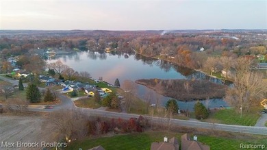 Welcome to The Villas at Beacon Hill--an updated, rare 4-bedroom on Beacon Hill Golf Club in Michigan - for sale on GolfHomes.com, golf home, golf lot