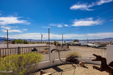 Step into comfort and style with this spacious 4-bedroom, 2 on London Bridge Golf Course in Arizona - for sale on GolfHomes.com, golf home, golf lot