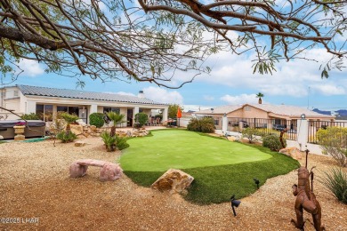 Step into comfort and style with this spacious 4-bedroom, 2 on London Bridge Golf Course in Arizona - for sale on GolfHomes.com, golf home, golf lot