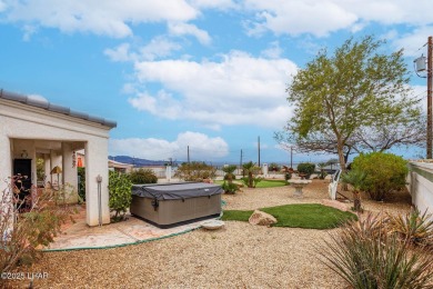Step into comfort and style with this spacious 4-bedroom, 2 on London Bridge Golf Course in Arizona - for sale on GolfHomes.com, golf home, golf lot