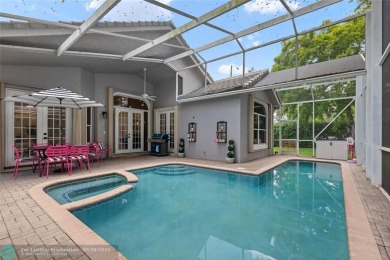 Beautifully updated home on an oversized 14,000 sq. ft. corner on TPC Eagle Trace in Florida - for sale on GolfHomes.com, golf home, golf lot