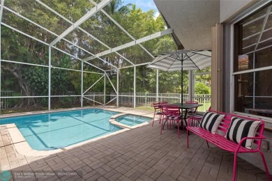 Beautifully updated home on an oversized 14,000 sq. ft. corner on TPC Eagle Trace in Florida - for sale on GolfHomes.com, golf home, golf lot