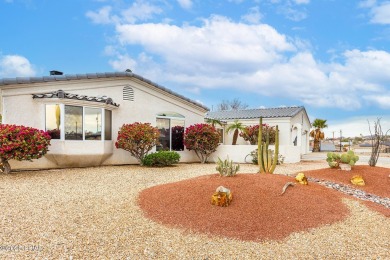 Step into comfort and style with this spacious 4-bedroom, 2 on London Bridge Golf Course in Arizona - for sale on GolfHomes.com, golf home, golf lot