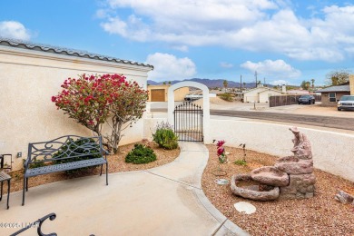 Step into comfort and style with this spacious 4-bedroom, 2 on London Bridge Golf Course in Arizona - for sale on GolfHomes.com, golf home, golf lot