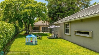 Beautifully updated home on an oversized 14,000 sq. ft. corner on TPC Eagle Trace in Florida - for sale on GolfHomes.com, golf home, golf lot