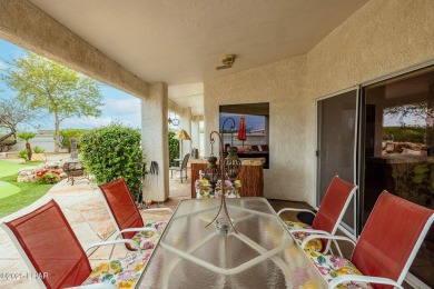 Step into comfort and style with this spacious 4-bedroom, 2 on London Bridge Golf Course in Arizona - for sale on GolfHomes.com, golf home, golf lot