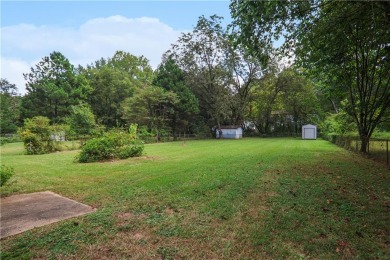 Beautifully renovated 4-bedroom, 2-bathroom home with on Browns Mill Golf Course in Georgia - for sale on GolfHomes.com, golf home, golf lot