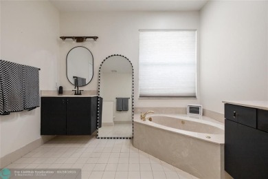 Beautifully updated home on an oversized 14,000 sq. ft. corner on TPC Eagle Trace in Florida - for sale on GolfHomes.com, golf home, golf lot