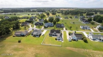 This exquisite home is a true Cape Cod designed and is 3145 on The Carolina Club in North Carolina - for sale on GolfHomes.com, golf home, golf lot