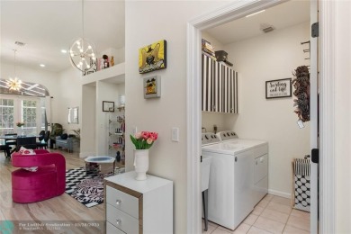 Beautifully updated home on an oversized 14,000 sq. ft. corner on TPC Eagle Trace in Florida - for sale on GolfHomes.com, golf home, golf lot