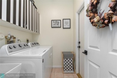 Beautifully updated home on an oversized 14,000 sq. ft. corner on TPC Eagle Trace in Florida - for sale on GolfHomes.com, golf home, golf lot