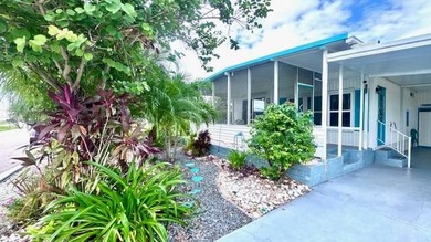 This charming 2-bedroom, 1.5-bath manufactured home offers on Riverbend Golf and Country Club in Florida - for sale on GolfHomes.com, golf home, golf lot
