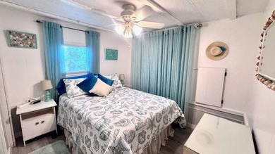 This charming 2-bedroom, 1.5-bath manufactured home offers on Riverbend Golf and Country Club in Florida - for sale on GolfHomes.com, golf home, golf lot