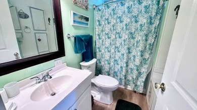This charming 2-bedroom, 1.5-bath manufactured home offers on Riverbend Golf and Country Club in Florida - for sale on GolfHomes.com, golf home, golf lot