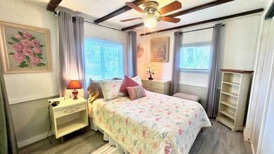 This charming 2-bedroom, 1.5-bath manufactured home offers on Riverbend Golf and Country Club in Florida - for sale on GolfHomes.com, golf home, golf lot