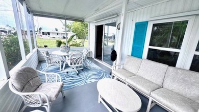 This charming 2-bedroom, 1.5-bath manufactured home offers on Riverbend Golf and Country Club in Florida - for sale on GolfHomes.com, golf home, golf lot