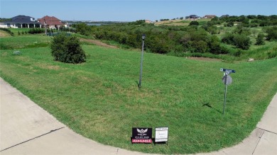This 0.6 acre lot inside the gates of The Sanctuary of Lake on Tangle Ridge Golf Club in Texas - for sale on GolfHomes.com, golf home, golf lot