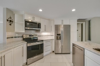 Luxurious Move-in Ready, Updated Waterfront Condo in Harbor on North Palm Beach Country Club in Florida - for sale on GolfHomes.com, golf home, golf lot