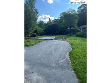 This is a Pull Thru RV Site waiting to happen! It is located in on Land Harbor Golf Course in North Carolina - for sale on GolfHomes.com, golf home, golf lot