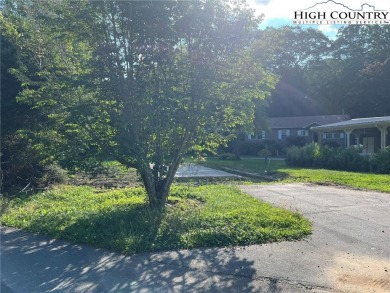 This is a Pull Thru RV Site waiting to happen! It is located in on Land Harbor Golf Course in North Carolina - for sale on GolfHomes.com, golf home, golf lot