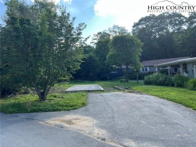 This is a Pull Thru RV Site waiting to happen! It is located in on Land Harbor Golf Course in North Carolina - for sale on GolfHomes.com, golf home, golf lot