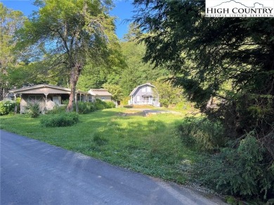 This is a Pull Thru RV Site waiting to happen! It is located in on Land Harbor Golf Course in North Carolina - for sale on GolfHomes.com, golf home, golf lot