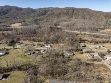 Explore this captivating lot along Buffalo Creek, an ideal site on Buffalo Valley Golf Course in Tennessee - for sale on GolfHomes.com, golf home, golf lot