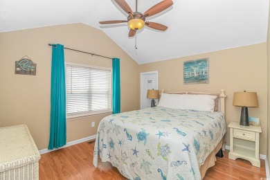 This spacious 4 Bedroom 3 Bath raised beach house is just a very on Prestwick Country Club in South Carolina - for sale on GolfHomes.com, golf home, golf lot