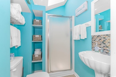 This spacious 4 Bedroom 3 Bath raised beach house is just a very on Prestwick Country Club in South Carolina - for sale on GolfHomes.com, golf home, golf lot
