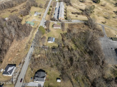 Explore this captivating lot along Buffalo Creek, an ideal site on Buffalo Valley Golf Course in Tennessee - for sale on GolfHomes.com, golf home, golf lot