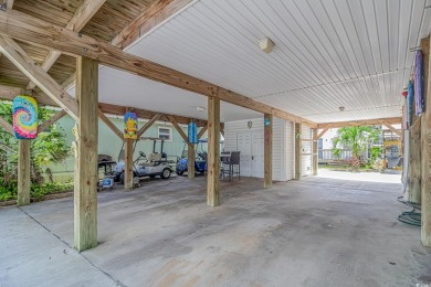 This spacious 4 Bedroom 3 Bath raised beach house is just a very on Prestwick Country Club in South Carolina - for sale on GolfHomes.com, golf home, golf lot