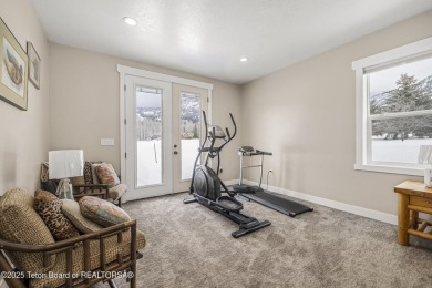 This stunning custom-built home sits on a generous lot right on on Star Valley RV Golf Course in Wyoming - for sale on GolfHomes.com, golf home, golf lot
