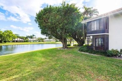 Stunning 2-Bedroom, 2-Bathroom Residence with Wrap-Around Lake on Quail Ridge Golf Course and Country Club in Florida - for sale on GolfHomes.com, golf home, golf lot