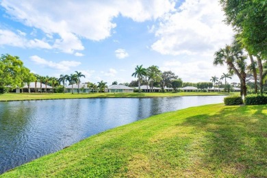 Stunning 2-Bedroom, 2-Bathroom Residence with Wrap-Around Lake on Quail Ridge Golf Course and Country Club in Florida - for sale on GolfHomes.com, golf home, golf lot