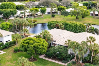 Stunning 2-Bedroom, 2-Bathroom Residence with Wrap-Around Lake on Quail Ridge Golf Course and Country Club in Florida - for sale on GolfHomes.com, golf home, golf lot